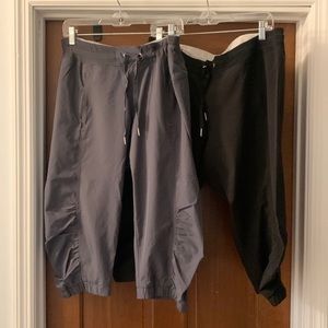Two pair of Calvin Klein athletic material capris sold as set.